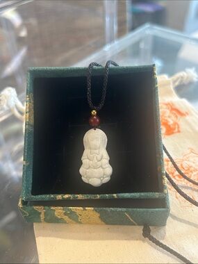 White Jade Buddha Pendant Necklace 1.25”x .5” with Black Adjustable Cord NWT NIB